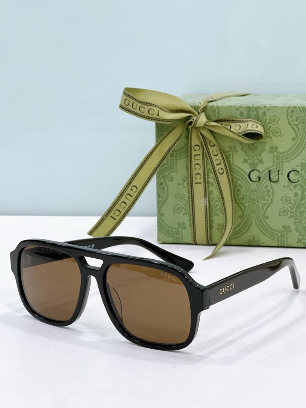 Gucci unisex Black Frame with Brown Lenses Sunglasses